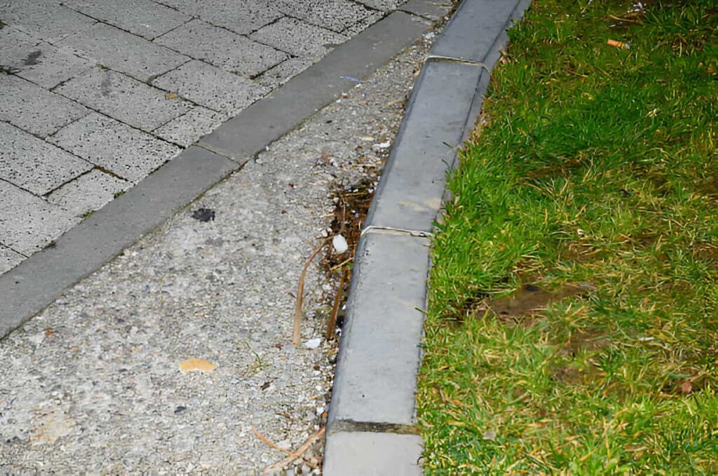 How Can Sidewalk Repair Improve Your Home's Value?